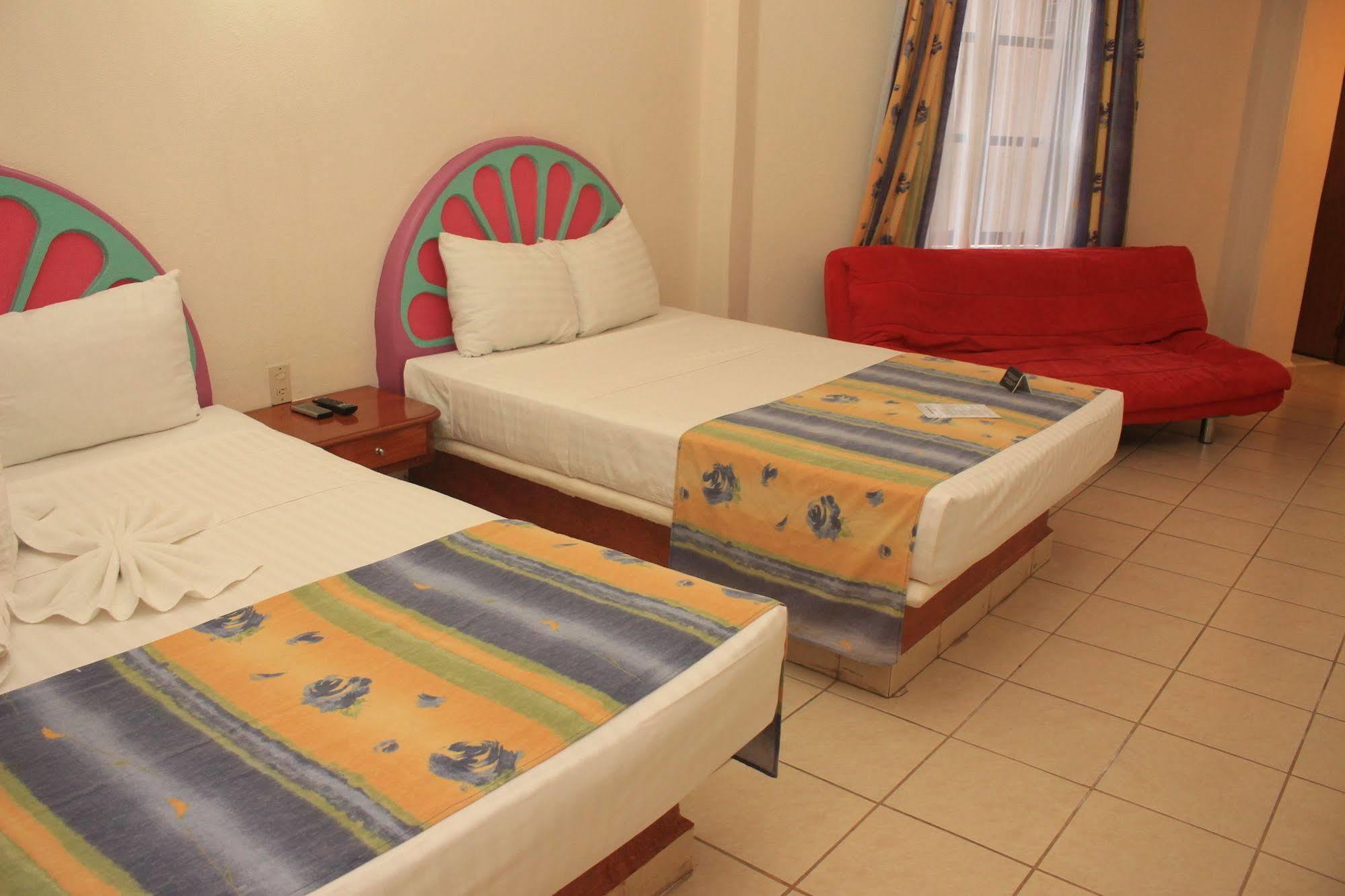 Am Amakal Hotel & Park Санта Крус Уатулко Екстериор снимка